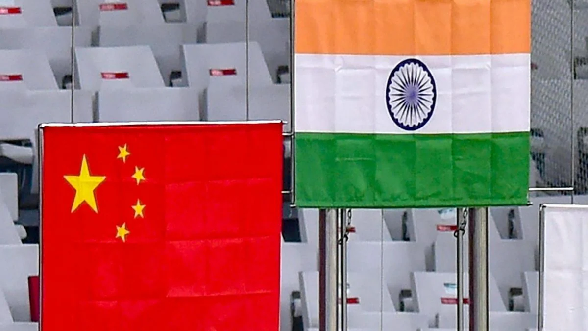 China Trying to Block India’s PLI Scheme at WTO – flags of China and India highlight the trade dispute between the two nations.
